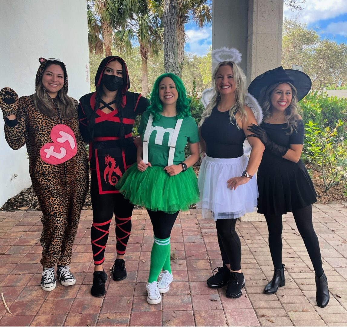 A group of people dressed up in costumes.