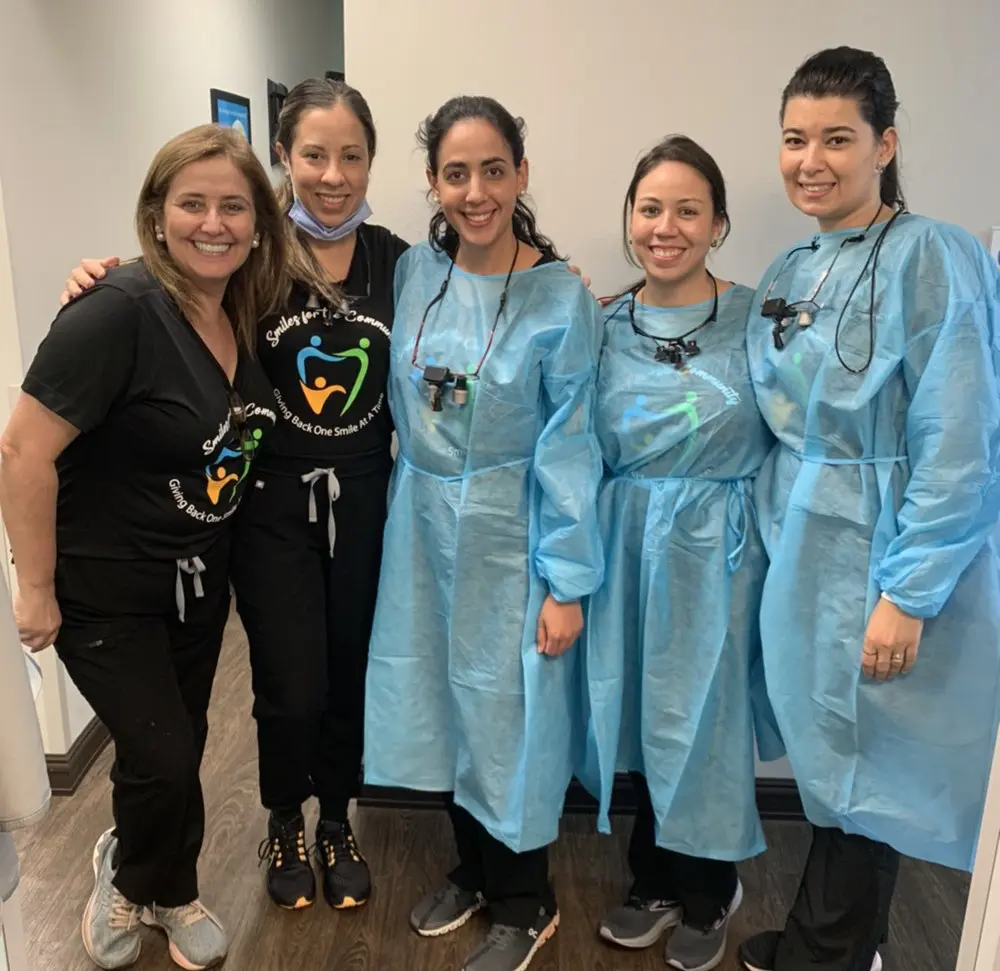 A group of doctors standing next to each other.