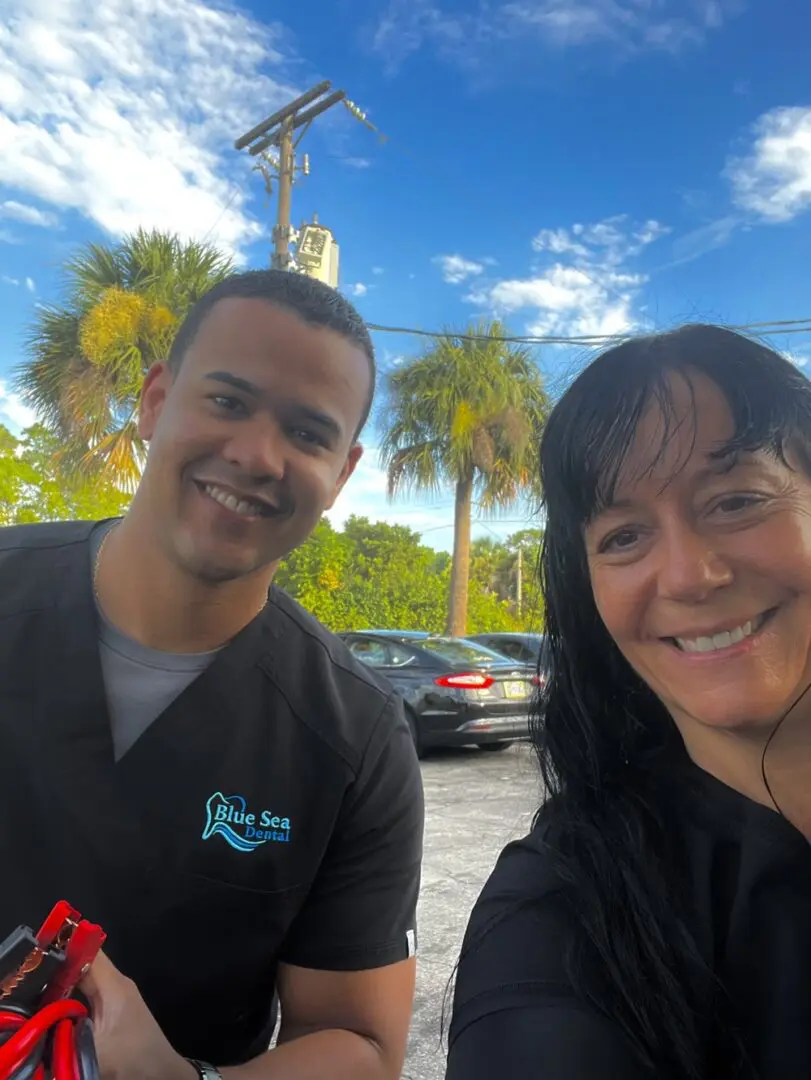 A man and woman smiling for the camera.