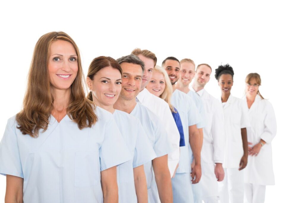 A group of doctors standing in front of each other.